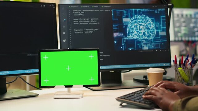 Admin writing code on isolated screen tablet, developing machine learning APIs. IT specialist using chroma key device to troubleshoot software errors using artificial intelligence, camera A