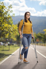 Young female with crutches