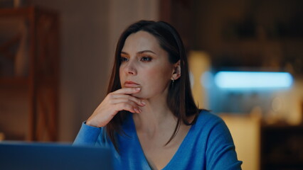 Thoughtful manager pondering startup sitting evening apartment closeup. 