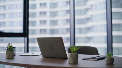 Fototapeta premium Modern empty workspace laptop on office desk. Corporate environment for work