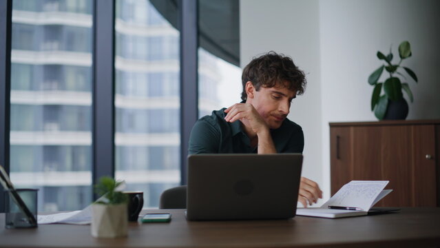 Hardworking employee creating project at creative agency office closeup. 