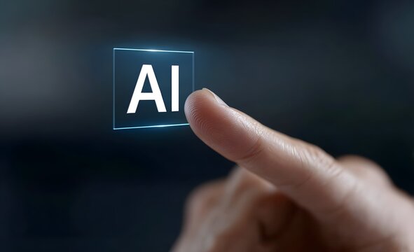 A finger touching a glowing ai button on a dark background representing artificial intelligence concept