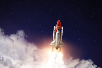 Modern space rocket in beautiful starry sky