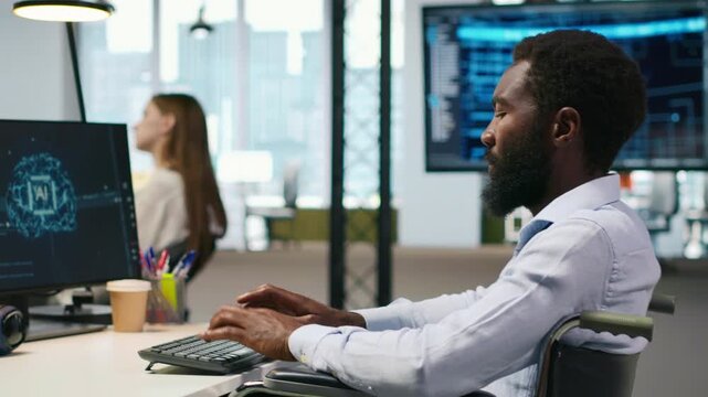 Computer scientist with paraplegia in office automating repetitive tasks with AI scripts. IT professional in wheelchair using artificial intelligence to speed up feature implementation, camera A