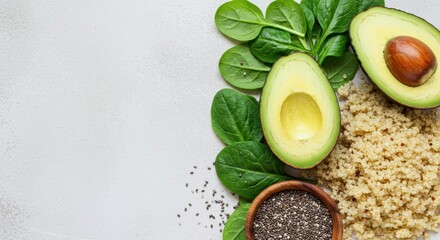 Fresh Avocado, Quinoa, Spinach, and Chia Seeds Arrangement on a Light Background for Healthy Eating Concepts