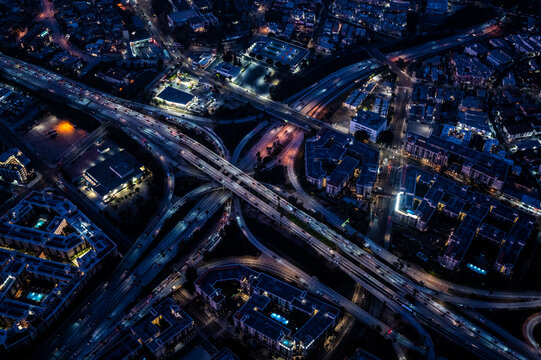 Night Aerial View of a Los Angeles Freeway Interchange and Illuminated City Blocks
