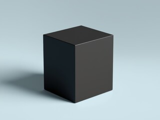 A dark gray rectangular prism standing upright on a light blue surface in a studio setting view shot