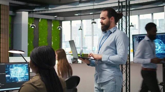 Team of programmers in office developing software applications, integrating AI driven automation in operations. Developers at work debugging applications to resolve issues, camera A