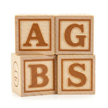 Wooden alphabet blocks with letters agbs isolated on white background