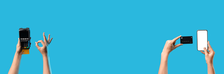 Hands with payment terminal, mobile phone and credit cards on blue background with space for text