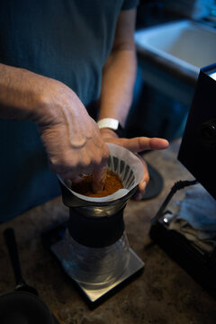 Barista making drip coffee 