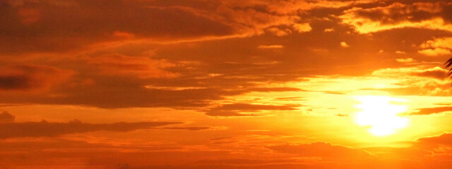 Banner Scenic view dramatic beautiful sunset sky. Panorama Natural Sunset Sunrise on meadow silhouette shadow dark land. Vibrant dramatic sky in Countryside. Landscape Sky At Sunset with copy space