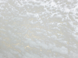 Ethereal Sky Background with Soft White Clouds and Golden Light