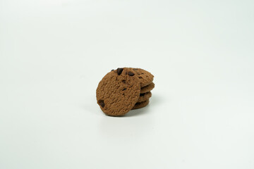 Pile of Delicious Chocolate Cookies with Chocolate Chips on White Background
