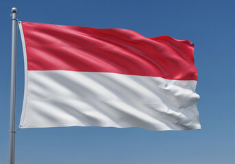 Indonesian Flag Waving Proudly Against a Vibrant Blue Sky Symbol of Patriotism and National Pride
