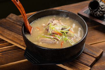Samgyetang – Korean Ginseng Chicken Soup with Whole Young Chicken Stuffed with Glutinous Rice, Garlic, Jujube, and Ginseng in Clear Broth, Traditional Health-Boosting Summer Dish
