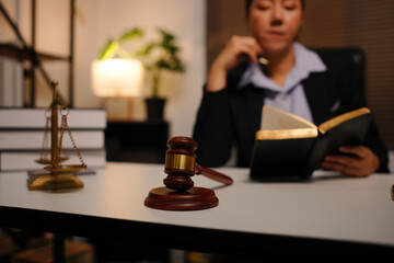 Lawyer female lawyer is discussing a contract agreement.
