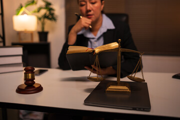 female lawyer works on legal matters at the office.