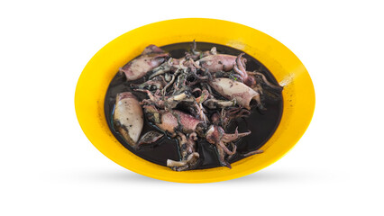 Traditional Thai seafood dish featuring baby squid cooked in its own ink