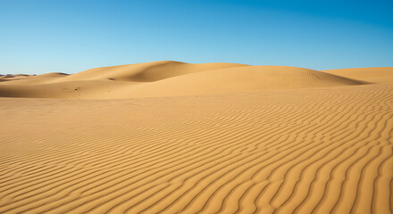 Desert Sand Dunes Under Clear Blue Sky







