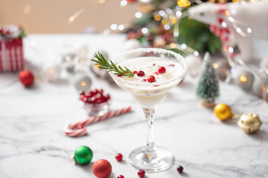 Mistletoe Margarita is a festive classic cocktail with white chocolate, tequila and cranberry