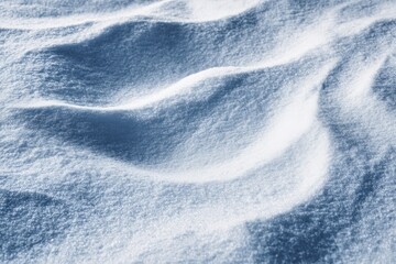 Stunning winter scene featuring a snow covered landscape Unique snow texture Wind formed designs on the surface Close up perspective with space for text