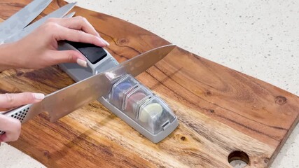 Sharpening Kitchen Knife with Manual Sharpening Stone
