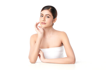 A beautiful young Asian woman with clean, fresh skin against a white background. Skincare, facial...