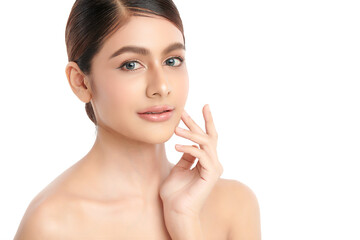 A beautiful young Asian woman with clean, fresh skin against a white background. Skincare, facial...