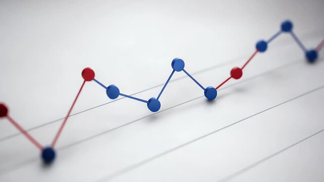 Close up of a business data chart with red and blue lines over white paper Business analytics concept.
