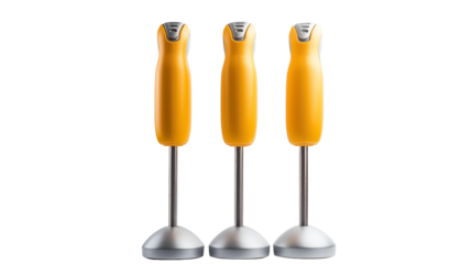 Three yellow hand blenders stand uprightisolated on transparent background