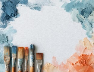 Paintbrushes on canvas with vibrant color swatches