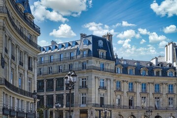 Eye-level shot of a building with traditional Haussmannian architecture.