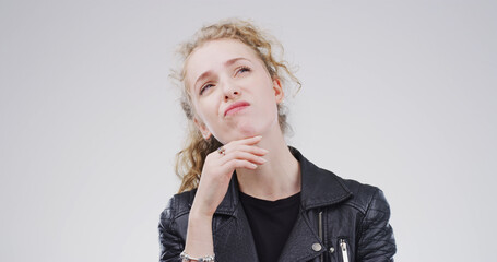 Face, ideas and solution with woman on studio space for brainstorming, planning or problem solving....