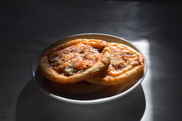 Homemade pizza is made using an oven