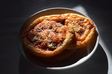 Homemade pizza is made using an oven