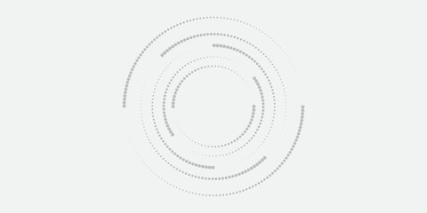 Minimalist abstract image featuring concentric dotted circles in shades of grey on a light background, creating a modern and tech-inspired circular pattern.