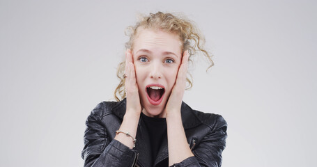 Woman, surprise and scream with in studio portrait for deal, good news and shock on white...