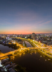 Panoramic view of Saigon, Vietnam from above at Ho Chi Minh City's central business district. Cityscape and many buildings, local houses, rivers. Landscape concept.
