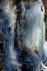 Ice formations with sunshine and shadows in Bolton, Connecticut.