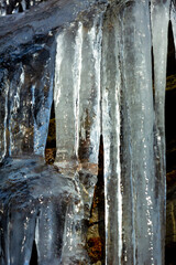 Ice formations with sunshine and shadows in Bolton, Connecticut.
