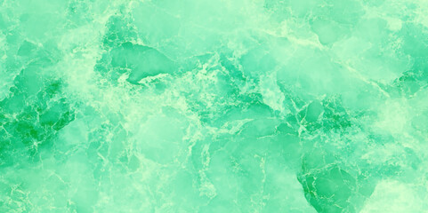 Marbled surface with a vibrant green color scheme, It features swirling patterns and delicate veins in shades of lime green and yellow, The effect is reminiscent of polished stone.