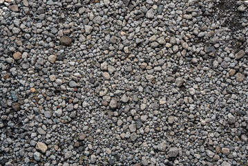 Full Frame of Small Gravel Stones on Ground Surface.