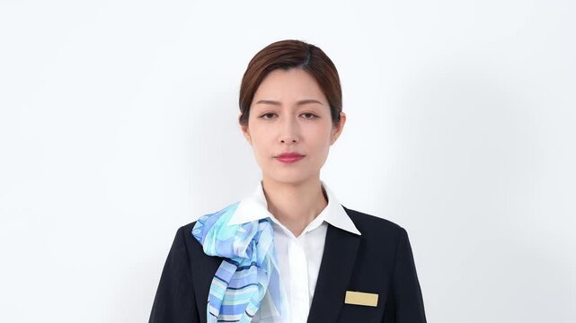 お辞儀する女性店員・受付スタッフ