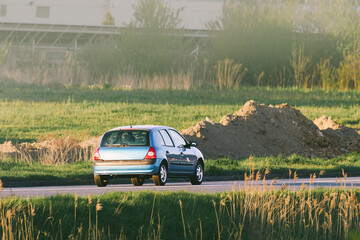 Fototapeta premium Smart compact city vehicle on asphalt lane