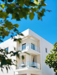 Fototapeta premium Modern White Building with Balconies