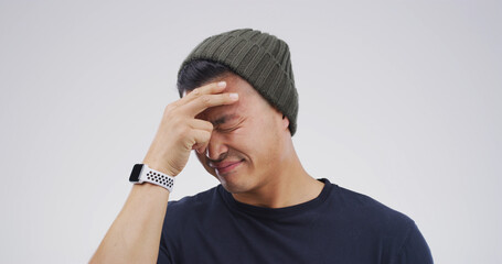 Pain, hurt or man with headache in studio with stress, nervous breakdown or artist. Burnout space, loss or creative designer with migraine on white background with discomfort, dizziness or crisis