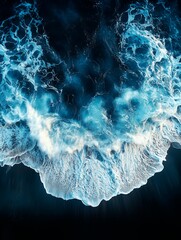 A top-down view of the ocean against a dark night sky with a black background in a realistic