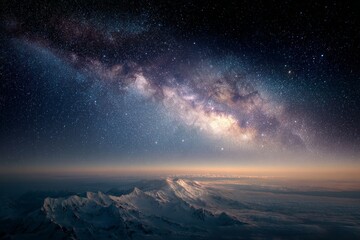 Naklejka premium Distant Mountains Under a Shimmering Milky Way Galaxy in the Quiet Night Sky