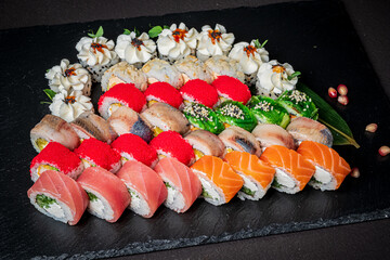 A colorful assortment of sushi rolls, beautifully crafted and ideal for sharing